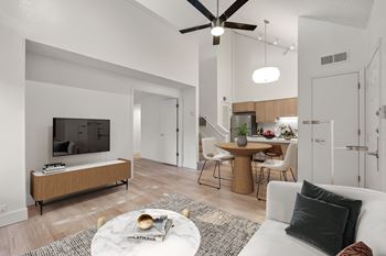 Elegant living room with tv and fan